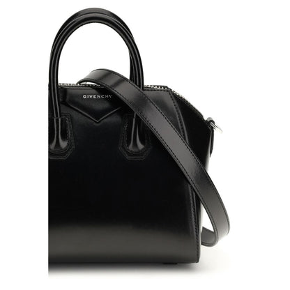 Compact Evening Box Clutch Handbag by Givenchy for women in bos taurus calfskin leather black, silver & signature features a exquisite silhouette, showcasing a secure and exquisite with versatile shoulder-strap, handle & adjustable-strap for a exquisite finish.