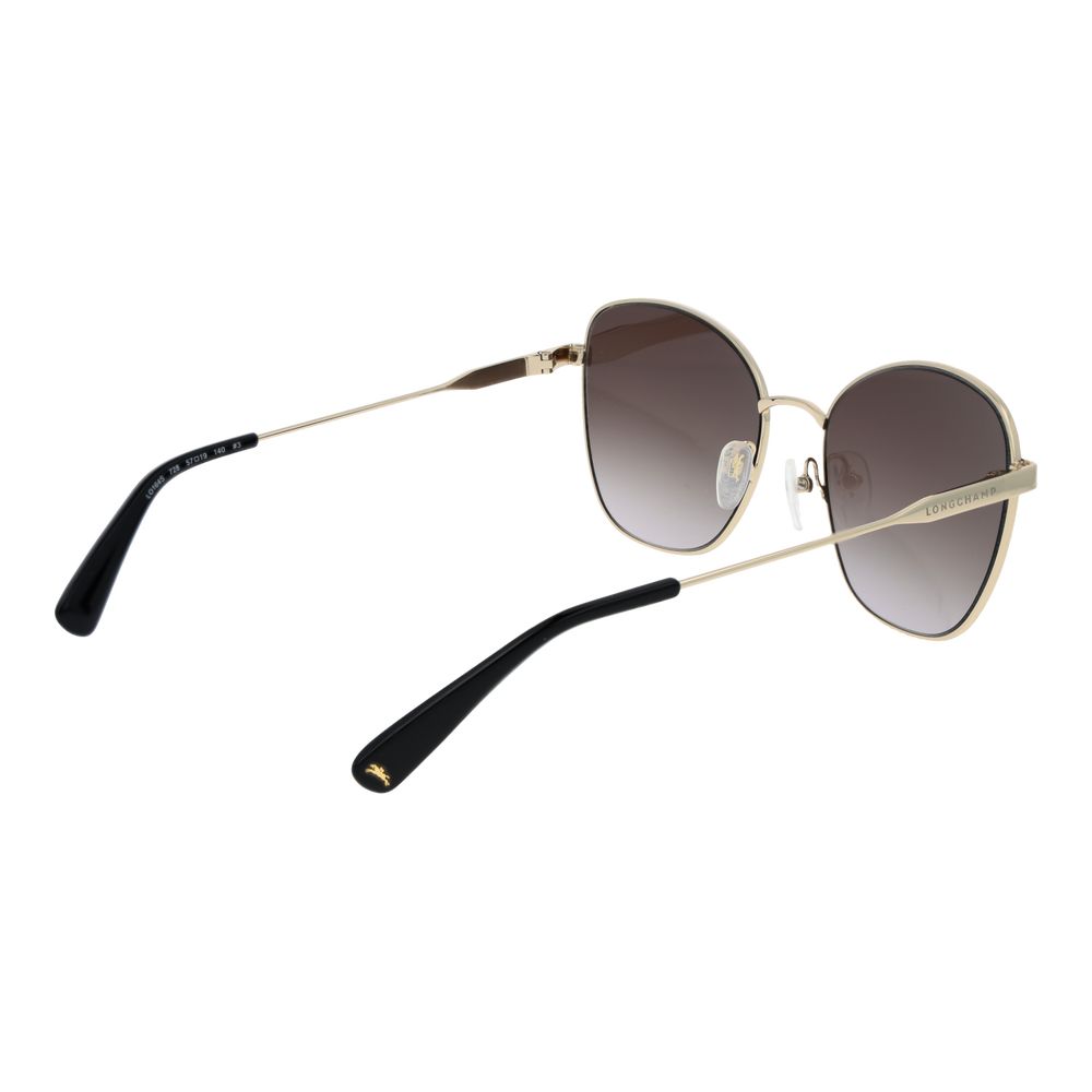 Sunglasses by Longchamp for women in metal gold features a sumptuous silhouette, showcasing a sumptuous butterfly full-rim frame design in gold coloured frame with high-performance gradient category-3-dark-tint lens.
