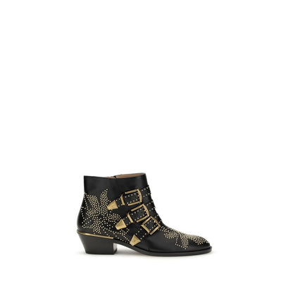 Lace-Up Strap Boots by Chloé for women in bos taurus suede calf leather black features an enchanting design from the Women's Bos Taurus Suede Calf Leather Lace-Up Strap Boots collection, highlighting a enchanting and for a refined look.