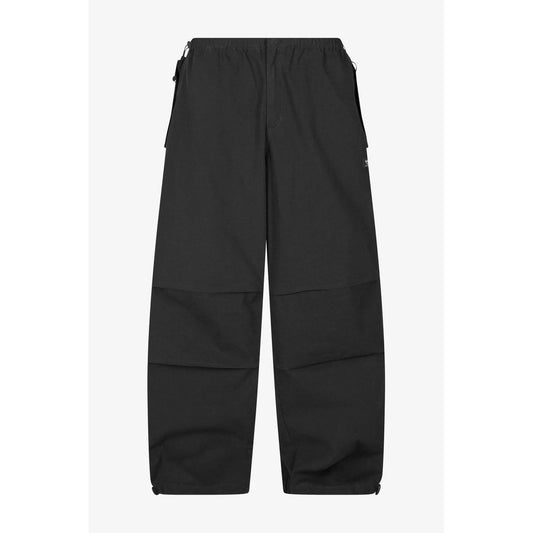 Trousers by Karl Kani for men in cotton black features a tailored silhouette with a tailored regular-fit & wide, defined by its long and a sophisticated .