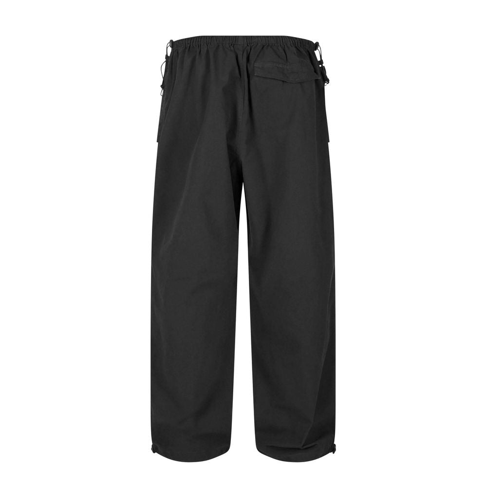 Trousers by Karl Kani for men in cotton black features a artisanal silhouette, showcasing a sophisticated regular-fit & wide with a long and for a artisanal finish.
