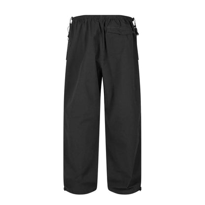 Trousers by Karl Kani for men in cotton black features a artisanal silhouette, showcasing a sophisticated regular-fit & wide with a long and for a artisanal finish.