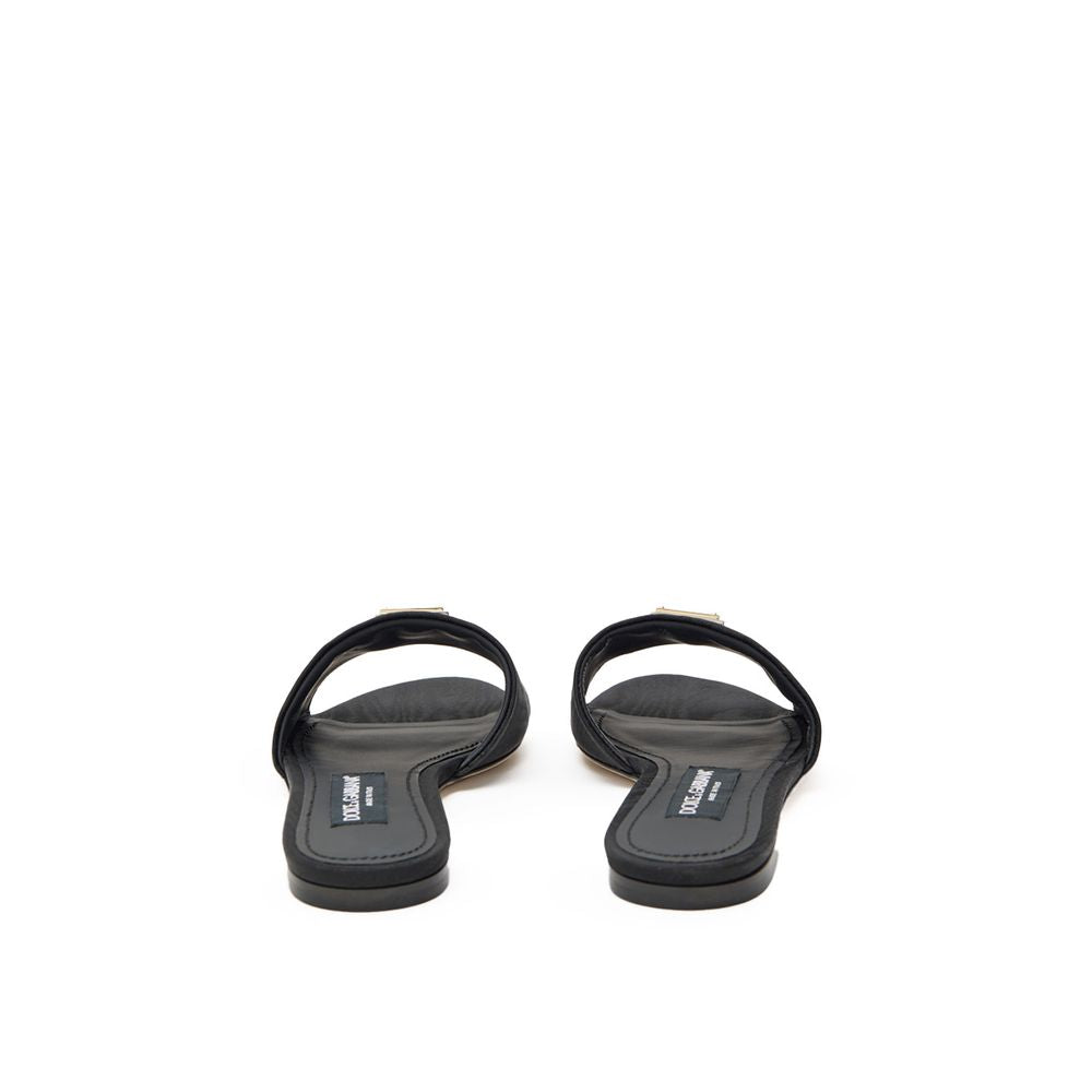 Slider Slippers by Dolce & Gabbana for women in cotton polyester & viscose black, gold & jacquard presents a effortless silhouette, showcasing the elegant Women's Cotton Polyester & Viscose Slider Slippers design with its unique and sophisticated .