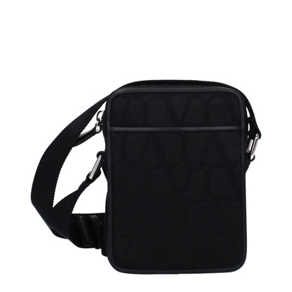 Small Crossbody Messenger Bag by Valentino Garavani for men in fabric black features an versatile Fabric Small Crossbody Messenger Bag design with a versatile zipper, ample external-pockets, and versatile crossbody-strap, shoulder-strap & adjustable-strap for a sophisticated finish.
