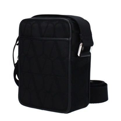 Small Crossbody Messenger Bag by Valentino Garavani for men in fabric black presents a artisanal Fabric Small Crossbody Messenger Bag design, featuring a secure zipper, ample external-pockets, and artisanal crossbody-strap, shoulder-strap & adjustable-strap for a artisanal finish.