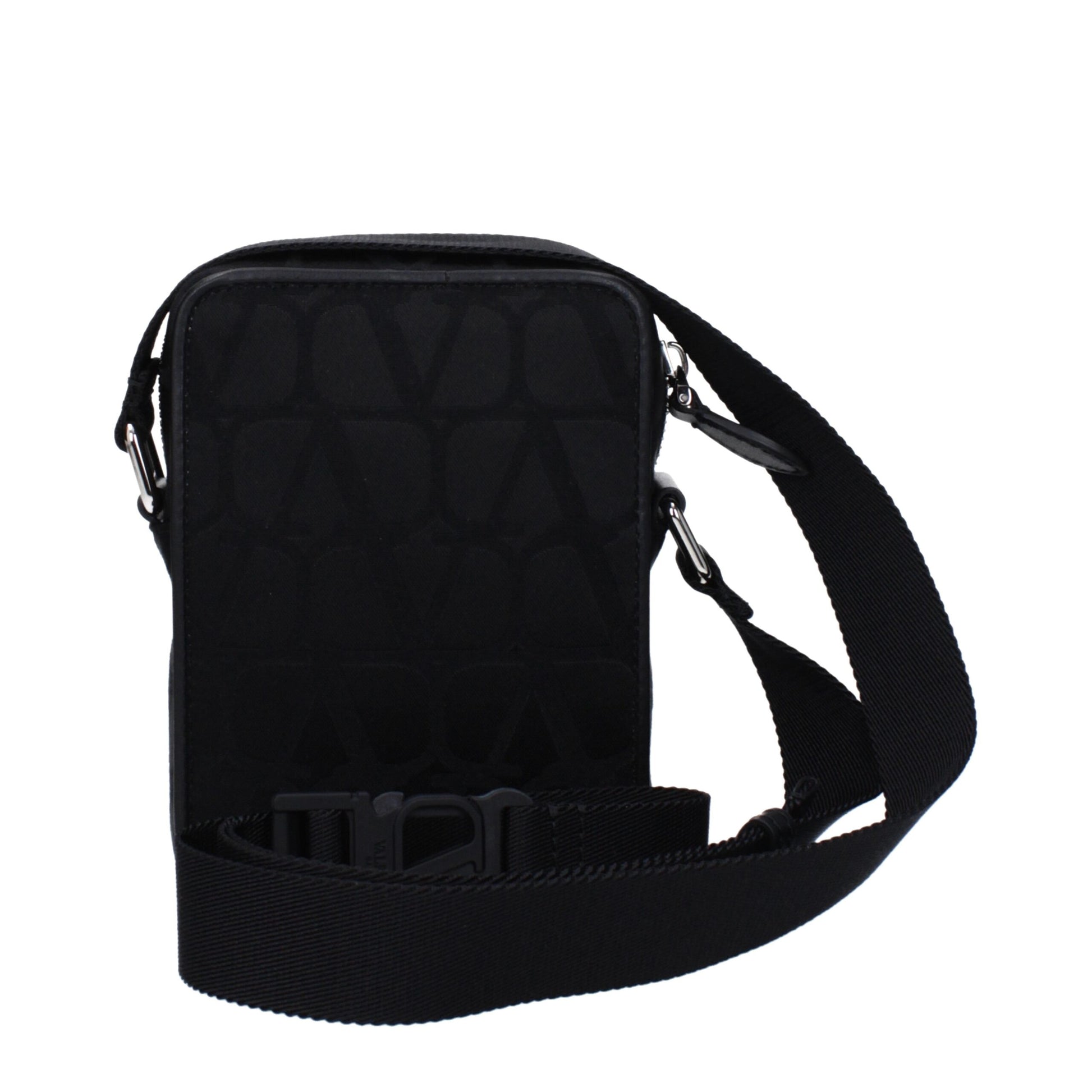 Small Crossbody Messenger Bag by Valentino Garavani for men in fabric black features a statement-making Fabric Small Crossbody Messenger Bag design with a secure zipper, statement-making external-pockets, and versatile crossbody-strap, shoulder-strap & adjustable-strap for a sophisticated look.