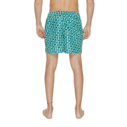 Swim Shorts by Nike for men in polyester green presents a beach chic silhouette from the Men's Quick-Drying Polyester Swim Shorts collection, showcasing a beach chic cut for a refined poolside look.