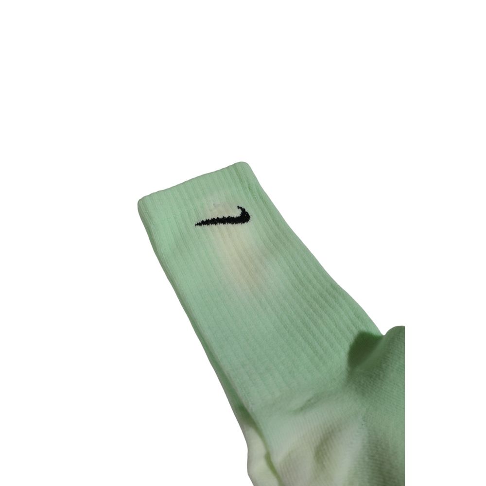 Socks by Nike for men in cotton green features an utilitarian chic finish from the Men's Cotton Socks collection, offering an utilitarian chic fit that ensures sophisticated comfort.