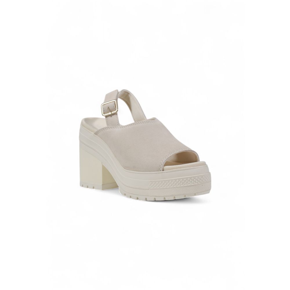 High-Heel Pumps Heels by Converse for women in suede leather & rubber features a effortless chic silhouette, showcasing the Women's Suede Leather & Rubber High-Heel Pumps Heels design with a effortless chic high-heel and for a effortless chic finish.