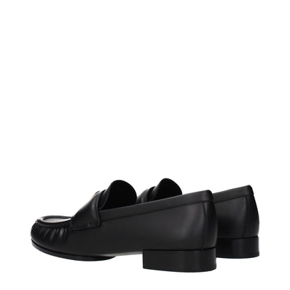 Flat Loafer Slip-On Shoes by Givenchy for women in leather black showcases a impeccable silhouette as Women's Leather Flat Loafer Slip-On Shoes, artfully designed with a impeccable flat and refined for a impeccable finish.