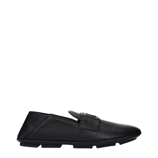 Loafer Slip-On Shoes by Dolce & Gabbana for men in leather black features an effortless chic silhouette, showcasing the Men's Leather Loafer Slip-On Shoes design with an effortless chic and a for a effortless chic look.