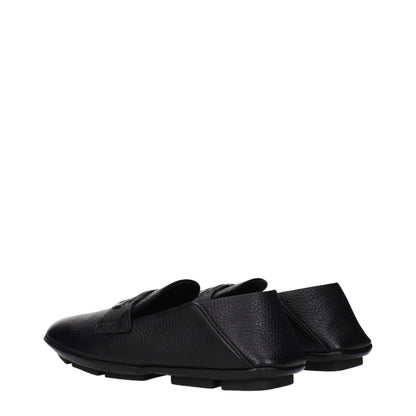 Loafer Slip-On Shoes by Dolce & Gabbana for men in leather black features an effortless chic silhouette, showcasing the Men's Leather Loafer Slip-On Shoes design with an effortless chic and a for a effortless chic look.