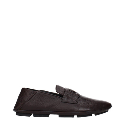 This Loafer Slip-On Shoes by Dolce & Gabbana for men in leather brown features an exquisite silhouette from the Men's Leather Loafer Slip-On Shoes collection, defined by a sophisticated and elegant .