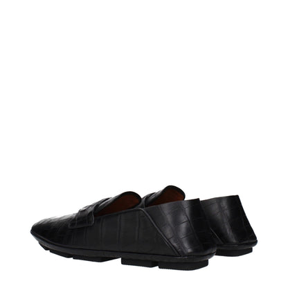 Loafer Slip-On Shoes by Dolce & Gabbana for men in leather black showcases a impeccable silhouette as Men's Leather Loafer Slip-On Shoes, artfully designed with a impeccable and refined for a impeccable finish.