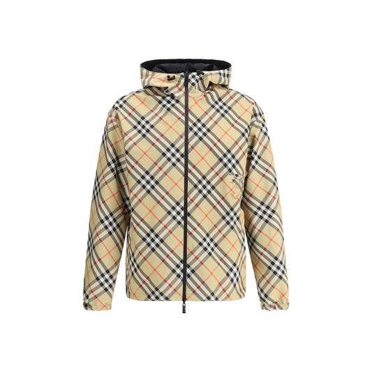 Hooded Overcoat by Burberry for men in polyester multicolor & patterned showcases a architectural silhouette, artfully detailed with a distinctive hooded neckline and functional water-resistant, pockets & hooded for a architectural finish.