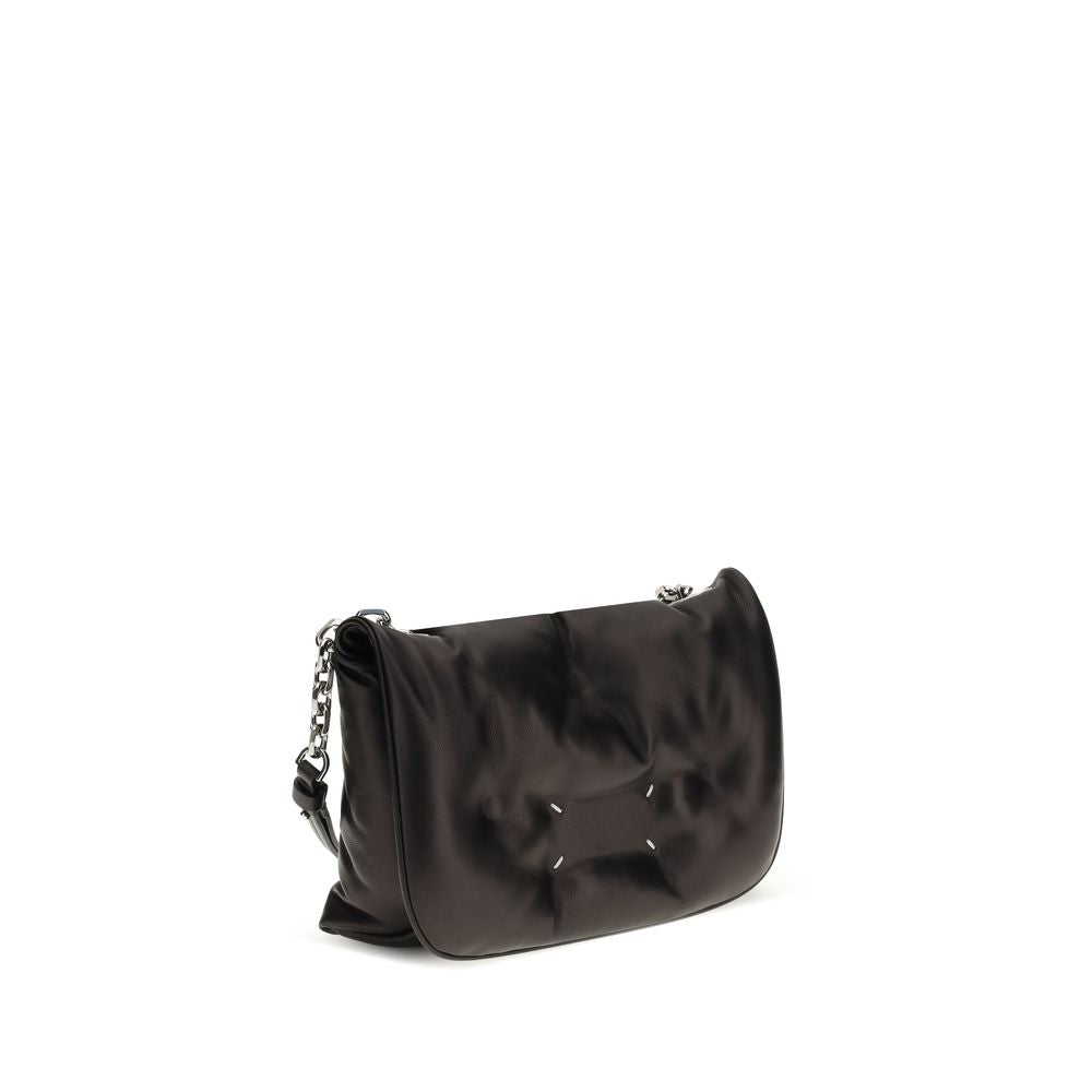 Evening Shoulder Bag by Maison Margiela for women in lambskin leather black presents a versatile silhouette, showcasing a secure flap and versatile with versatile shoulder-strap for a sophisticated look.