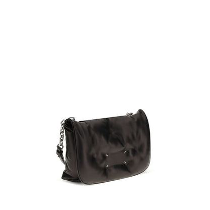 Evening Shoulder Bag by Maison Margiela for women in lambskin leather black presents a versatile silhouette, showcasing a secure flap and versatile with versatile shoulder-strap for a sophisticated look.