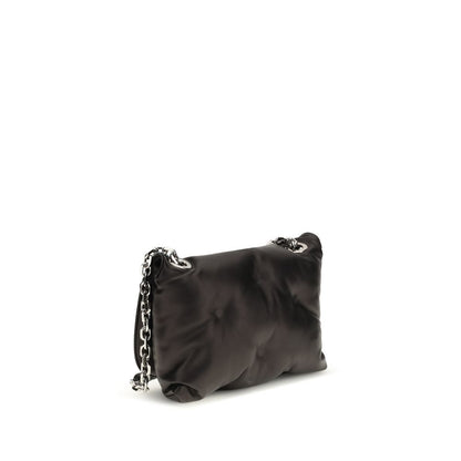 Evening Shoulder Bag by Maison Margiela for women in lambskin leather black features a distinguished silhouette, showcasing a secure flap and distinguished with versatile shoulder-strap for a distinguished finish.