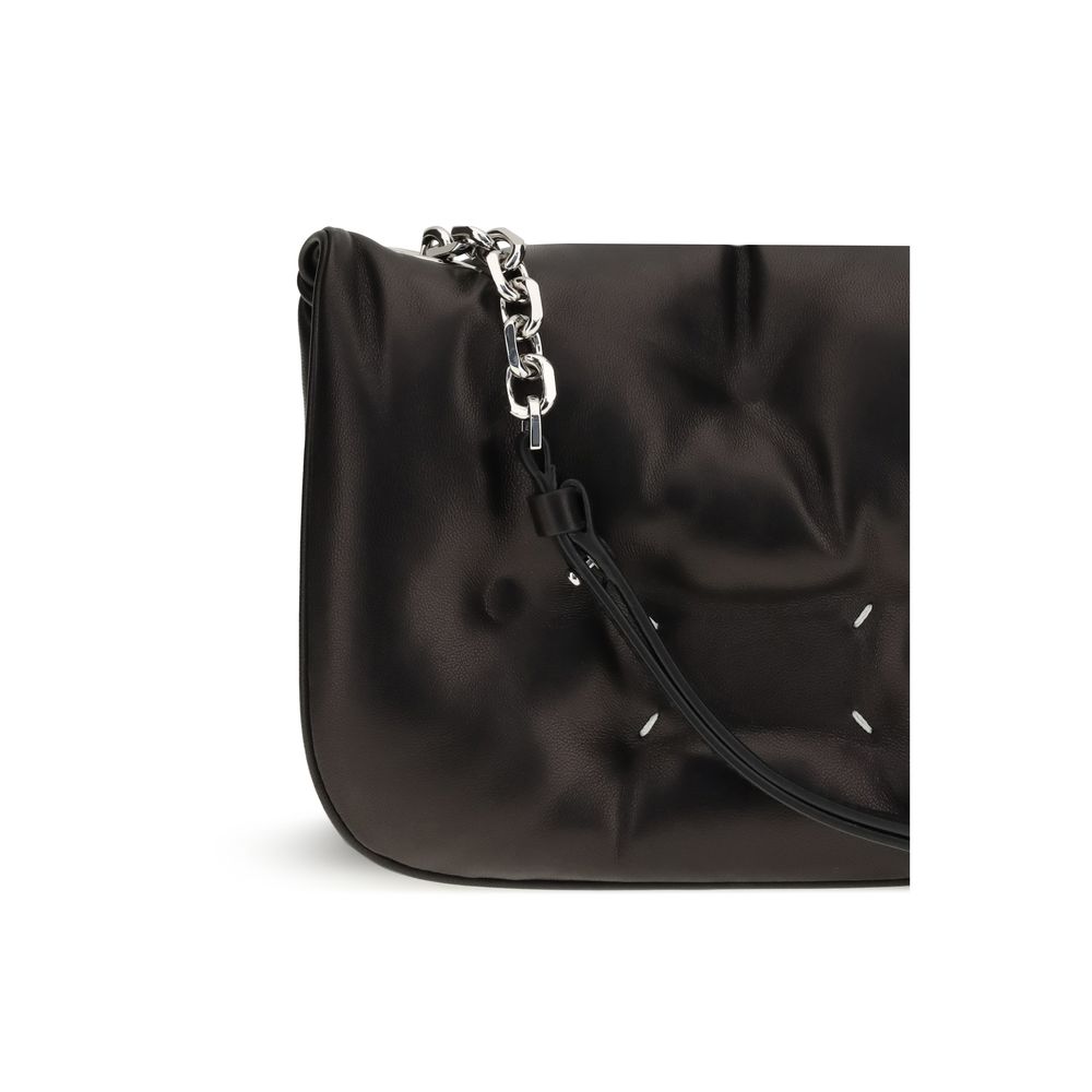 Evening Shoulder Bag by Maison Margiela for women in lambskin leather black features a effortless chic silhouette with a secure flap, ample , and versatile shoulder-strap for a effortless chic finish.