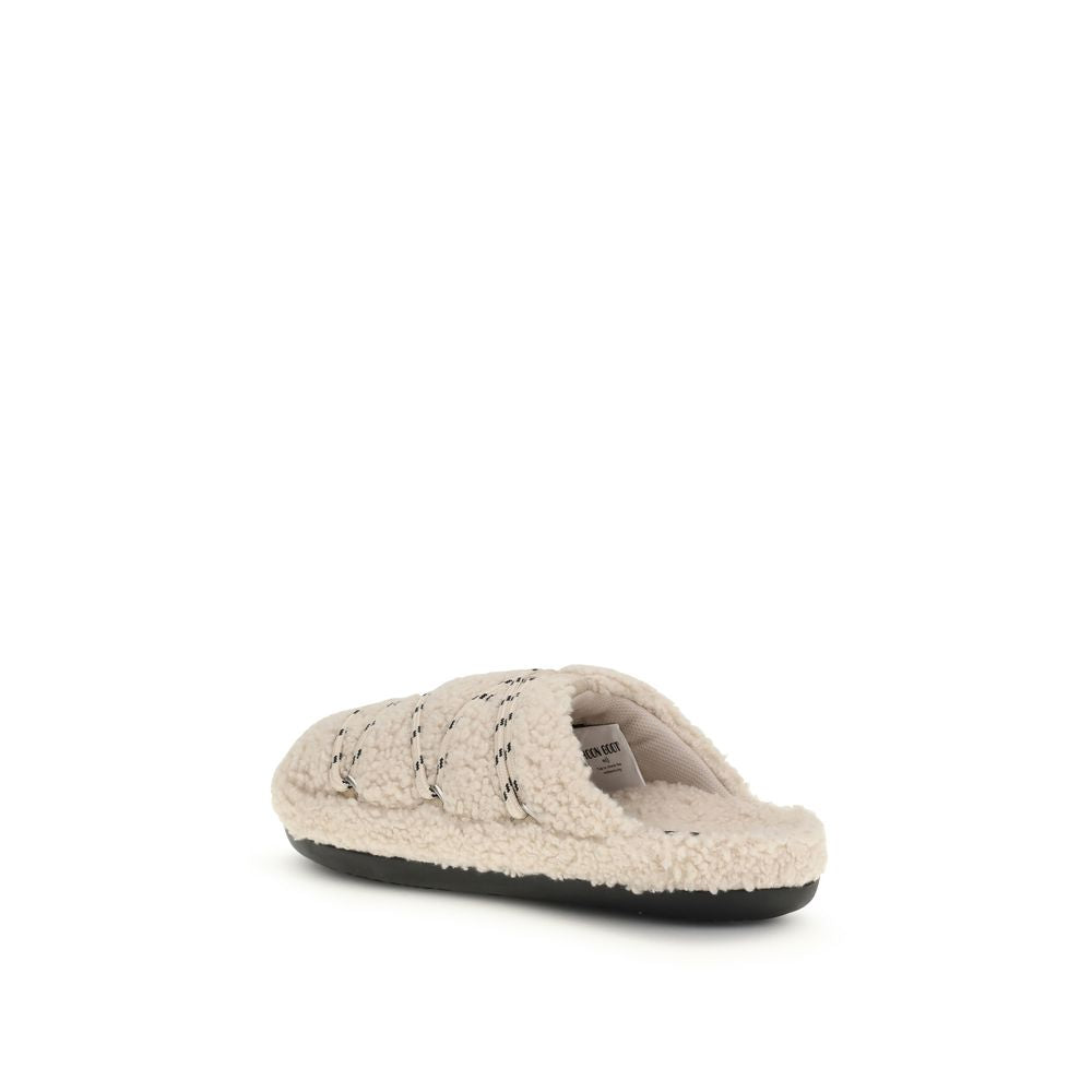 Slippers Flat Shoes by Moon Boot for women in polyamide & bos taurus calf leather beige showcases a dynamic silhouette, artfully capturing The Teddy Women's Polyamide & Bos Taurus Calf Leather Slippers Flat Shoes through its distinctive and elegant .