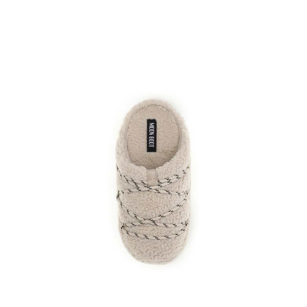 Slippers Flat Shoes by Moon Boot for women in polyamide & bos taurus calf leather beige presents a impeccable silhouette as The Teddy Women's Polyamide & Bos Taurus Calf Leather Slippers Flat Shoes, artfully designed with a and a impeccable for a refined, upscale finish.