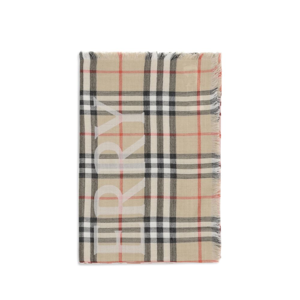 Scarf by Burberry for men in wool & silk beige & jacquard presents a effortlessly chic silhouette, artfully capturing the essence of the effortlessly chic Wool & Silk Shawl Fringes Scarf design for a sophisticated look.