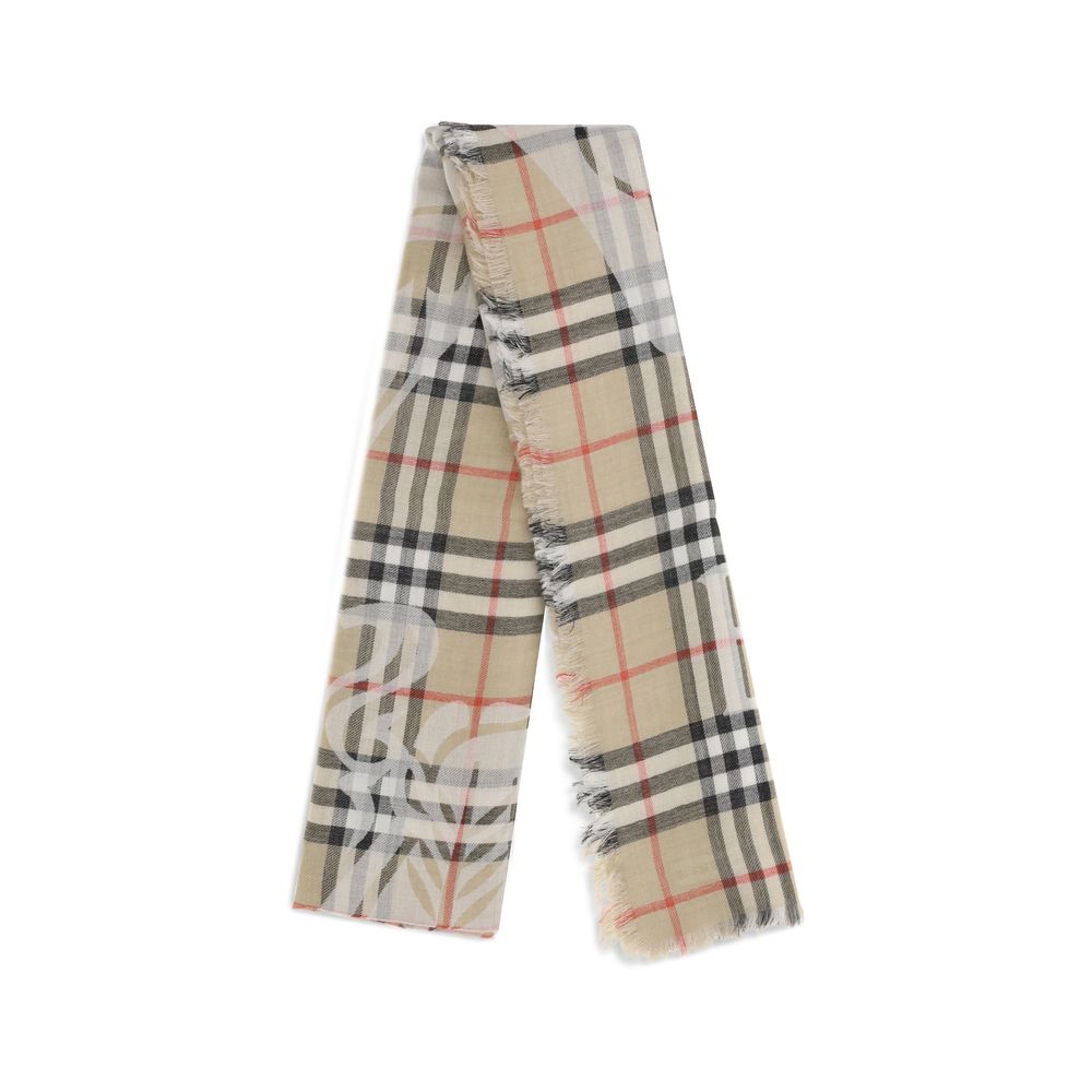 Scarf by Burberry for men in wool & silk beige & jacquard features a snug silhouette, perfectly showcasing the elegant drape and premium finish of the Wool & Silk Shawl Fringes Scarf.