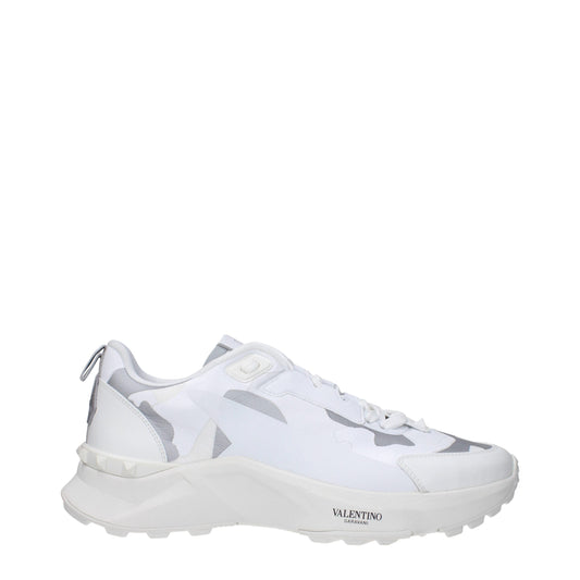 Athletic Sneakers by Valentino Garavani for men in rubber & fabric gray, light-grey & white showcases a architectural silhouette, artfully capturing the essence of the Men's Athletic Rubber & Fabric Sneakers with its signature architectural athletic style construction.