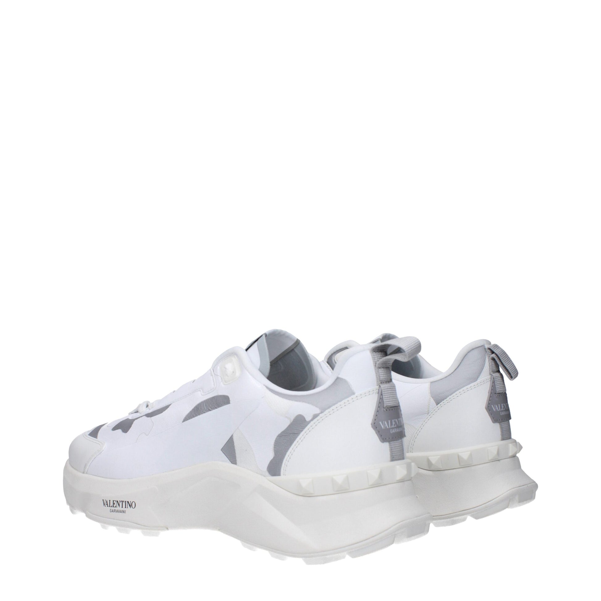 Athletic Sneakers by Valentino Garavani for men in rubber & fabric gray, light-grey & white showcases a architectural silhouette, artfully capturing the essence of the Men's Athletic Rubber & Fabric Sneakers with its signature architectural athletic style construction.