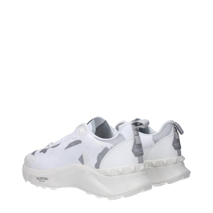 Athletic Sneakers by Valentino Garavani for men in rubber & fabric gray, light-grey & white showcases a architectural silhouette, artfully capturing the essence of the Men's Athletic Rubber & Fabric Sneakers with its signature architectural athletic style construction.