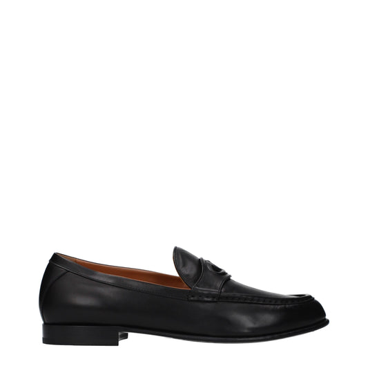 Loafer Slip-On Shoes by Valentino Garavani for men in leather black features an effortless chic silhouette, showcasing the Men's Leather Loafer Slip-On Shoes design with an effortless chic and a for a effortless chic look.