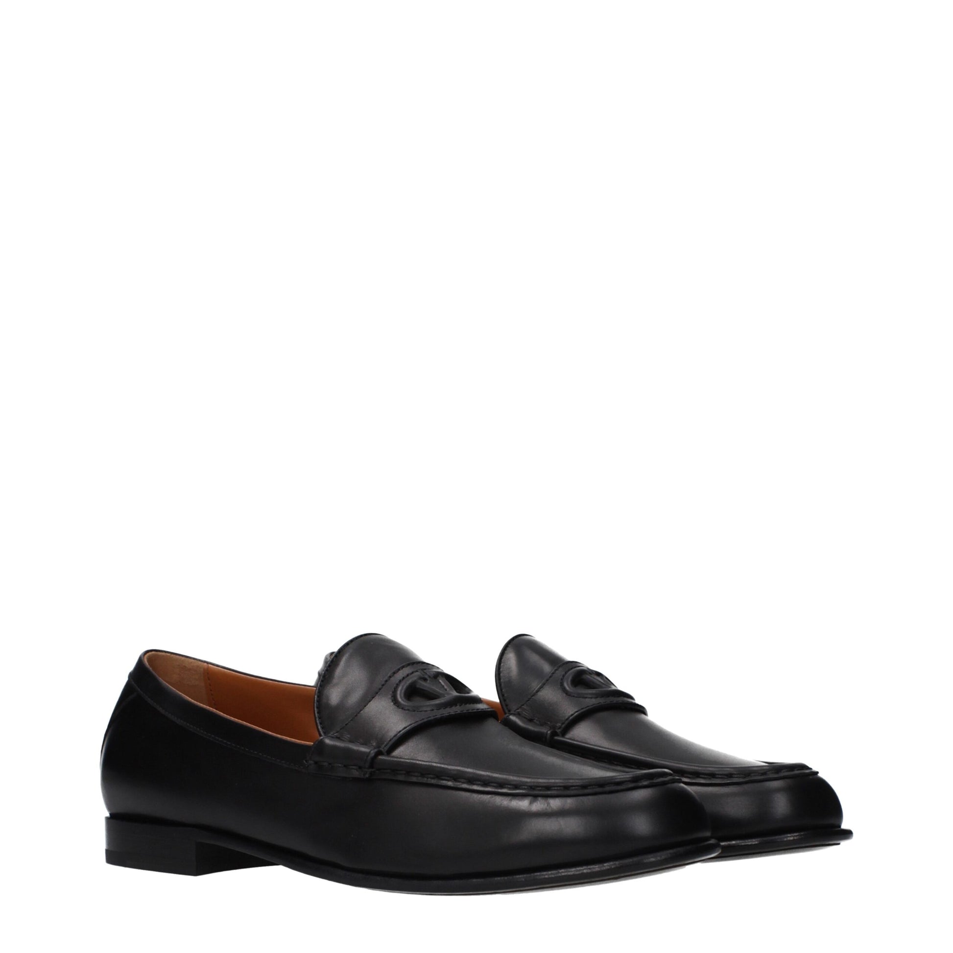 Loafer Slip-On Shoes by Valentino Garavani for men in leather black showcases a impeccable silhouette as Men's Leather Loafer Slip-On Shoes, artfully designed with a impeccable and refined for a impeccable finish.