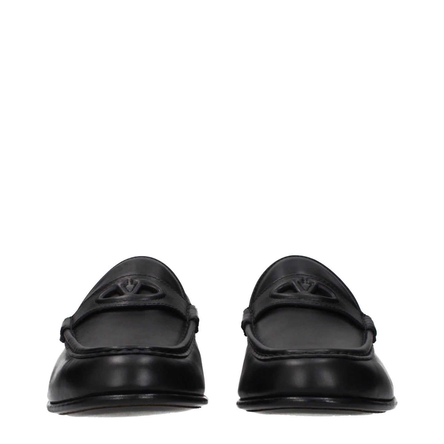 Loafer Slip-On Shoes by Valentino Garavani for men in leather black features an dynamic silhouette from the Men's Leather Loafer Slip-On Shoes collection, defined by a dynamic and for a dynamic look.