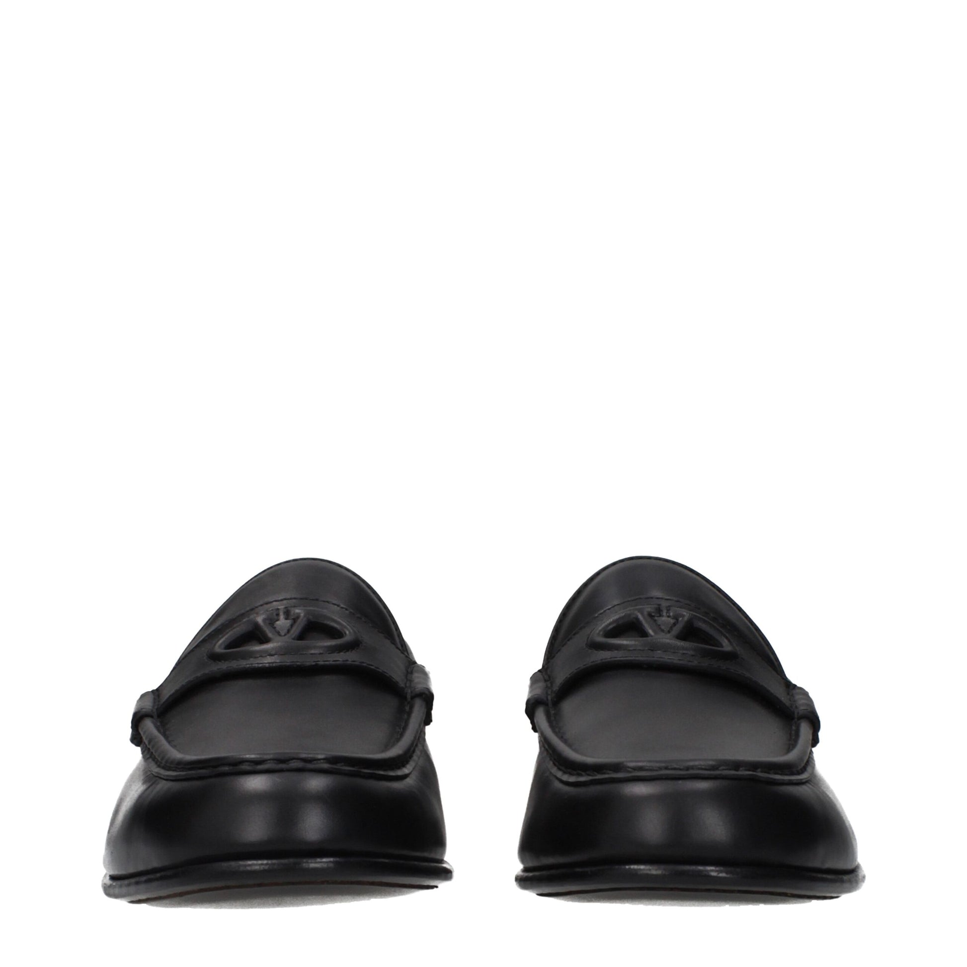Loafer Slip-On Shoes by Valentino Garavani for men in leather black features an dynamic silhouette from the Men's Leather Loafer Slip-On Shoes collection, defined by a dynamic and for a dynamic look.
