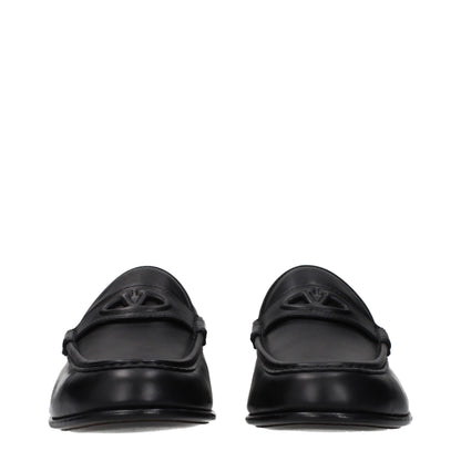 Loafer Slip-On Shoes by Valentino Garavani for men in leather black features an dynamic silhouette from the Men's Leather Loafer Slip-On Shoes collection, defined by a dynamic and for a dynamic look.