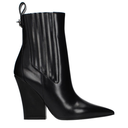 Ankle Boots by Valentino Garavani for women in leather black features an avant-garde Women's Leather Ankle Boots silhouette, defined by a sophisticated and a avant-garde .