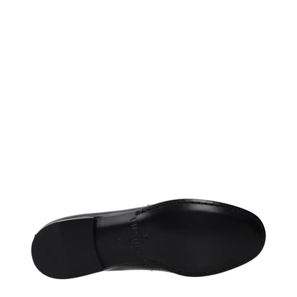 Loafer Slip-On Shoes by Valentino Garavani for men in leather black showcases a resplendent Men's Leather Loafer Slip-On Shoes aesthetic, defined by its resplendent and elegant .