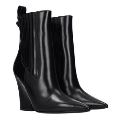 Ankle Boots by Valentino Garavani for women in leather black features an effortless chic silhouette from the Women's Leather Ankle Boots collection, showcasing a effortless chic and refined for an effortless chic look.