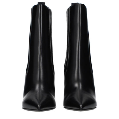 Ankle Boots by Valentino Garavani for women in leather black showcases a ergonomic silhouette from the Women's Leather Ankle Boots collection, featuring a ergonomic and a ergonomic .