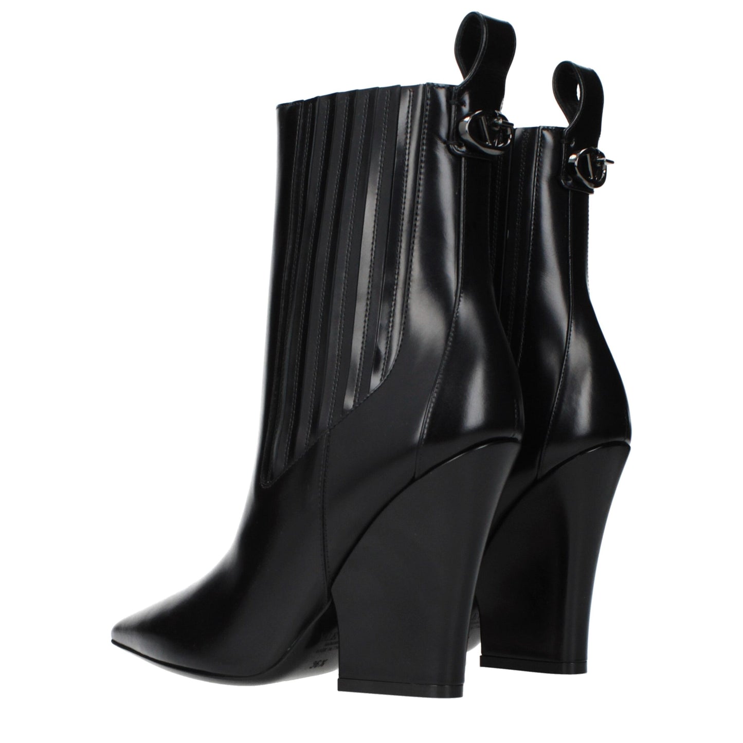 Ankle Boots by Valentino Garavani for women in leather black features an dynamic silhouette, showcasing the dynamic Women's Leather Ankle Boots design with its distinctive and elegant .