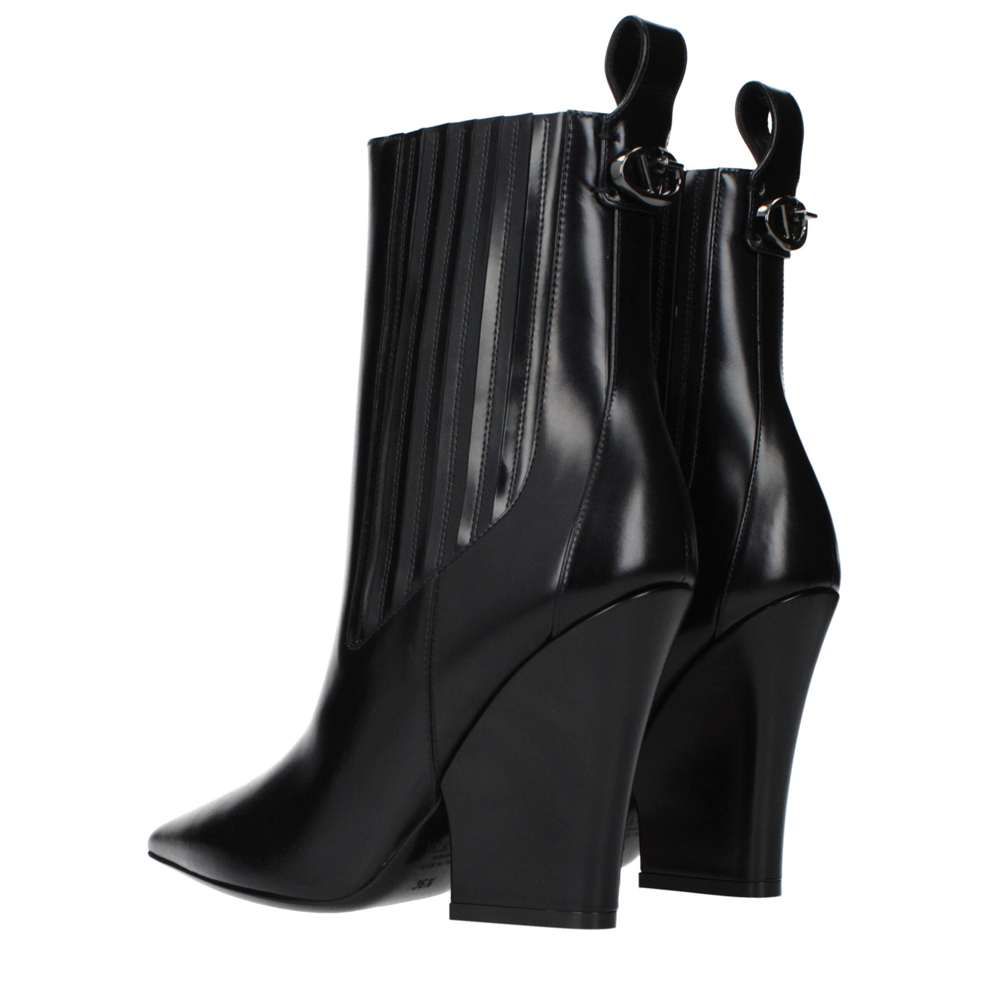 Ankle Boots by Valentino Garavani for women in leather black features an dynamic silhouette, showcasing the dynamic Women's Leather Ankle Boots design with its distinctive and elegant .