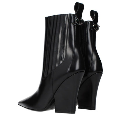 Ankle Boots by Valentino Garavani for women in leather black features an dynamic silhouette, showcasing the dynamic Women's Leather Ankle Boots design with its distinctive and elegant .