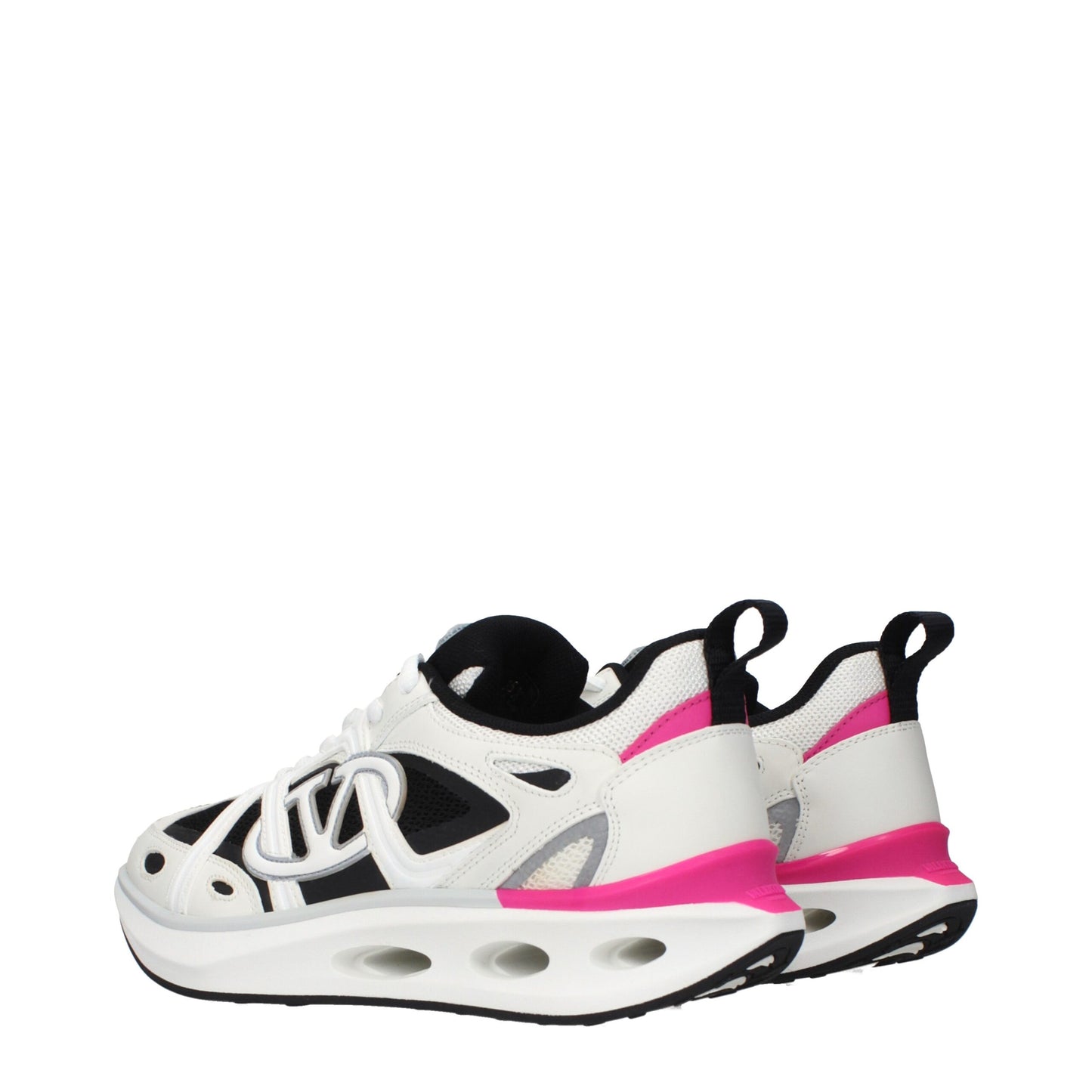 Athletic Sneakers by Valentino Garavani for women in fabric white showcases a architectural silhouette, artfully capturing the essence of the Women's Athletic Fabric Sneakers with its signature architectural athletic style construction.