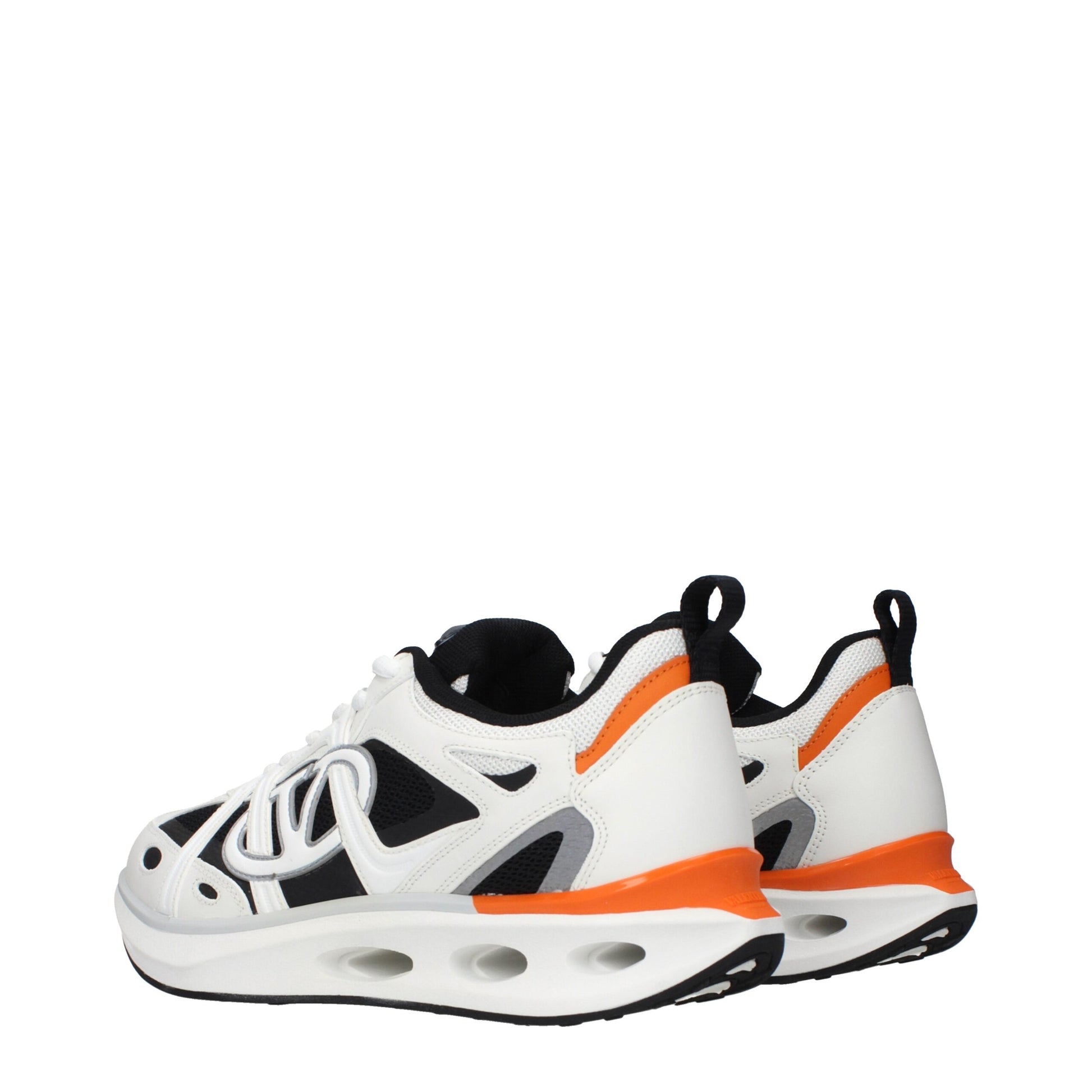 Athletic Sneakers by Valentino Garavani for men in fabric white showcases a architectural silhouette, artfully capturing the essence of the Men's Athletic Fabric Sneakers with its signature architectural athletic style construction.