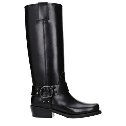 Boots by Valentino Garavani for women in leather black showcases a impeccable silhouette as Women's Leather Boots, artfully defined by a impeccable and a impeccable .