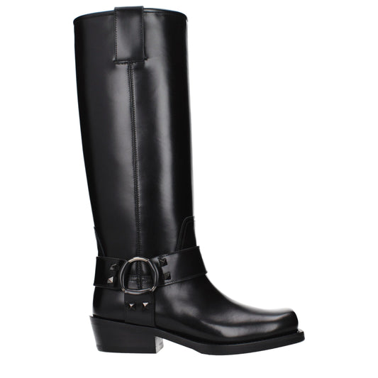 Boots by Valentino Garavani for women in leather black showcases a impeccable silhouette as Women's Leather Boots, artfully defined by a impeccable and a impeccable .
