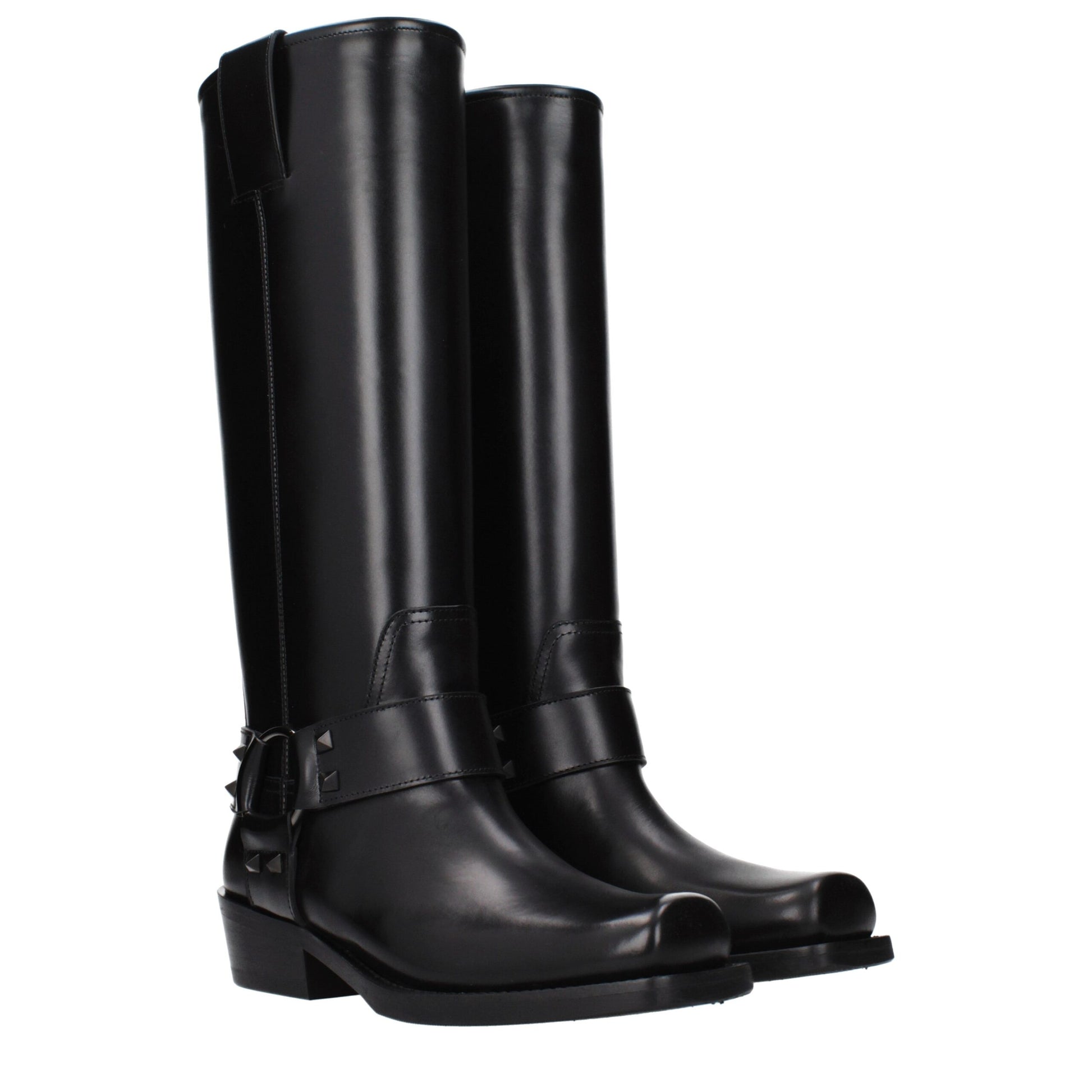 Boots by Valentino Garavani for women in leather black features an effortless chic silhouette from the Women's Leather Boots collection, showcasing a effortless chic and refined for an effortless chic look.