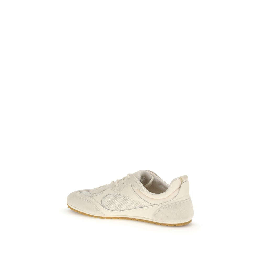 Sneakers by Tory Burch for women in polyester & bos taurus calf leather cream presents a impeccable silhouette as Women's Low Top Polyester & Bos Taurus Calf Leather Sneakers, expertly defined by a impeccable low-top style for a impeccable, high-fashion look.