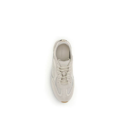 Sneakers by Tory Burch for women in polyester & bos taurus calf leather cream features a chic design, perfectly showcasing the chic low-top style of this Women's Low Top Polyester & Bos Taurus Calf Leather Sneakers.