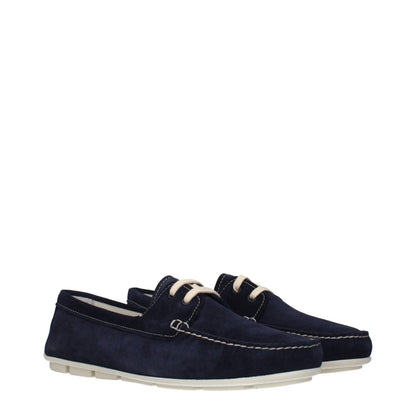 Flat Loafer Slip-On Shoes by Prada for women in suede leather blue showcases a timeless silhouette from the Women's Suede Leather Flat Loafer Slip-On Shoes collection, featuring a timeless flat and for a timeless finish.